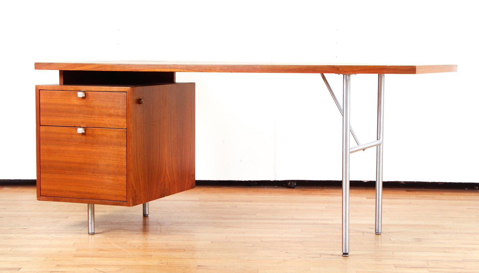GEORGE NELSON FOR HERMAN MILLER DESK: George Nelson (1908-1986) for Herman Miller, EOG desk, model 6030D-R, USA, 1950s, walnut, ebonized wood, steel, foil label, 55"w x 27"d x 30.5"h