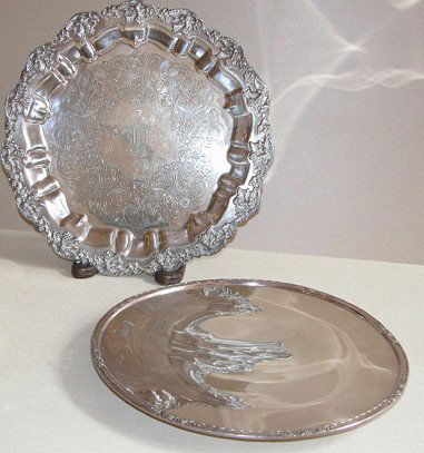 2 Silverplate trays: Title: 2 silverplate trays, both footed Medium: silverplate Signature: marked Camille International Silver Company 6021 on underside; marked Barbour SPCo International S Co 05644/13 hand chased on und