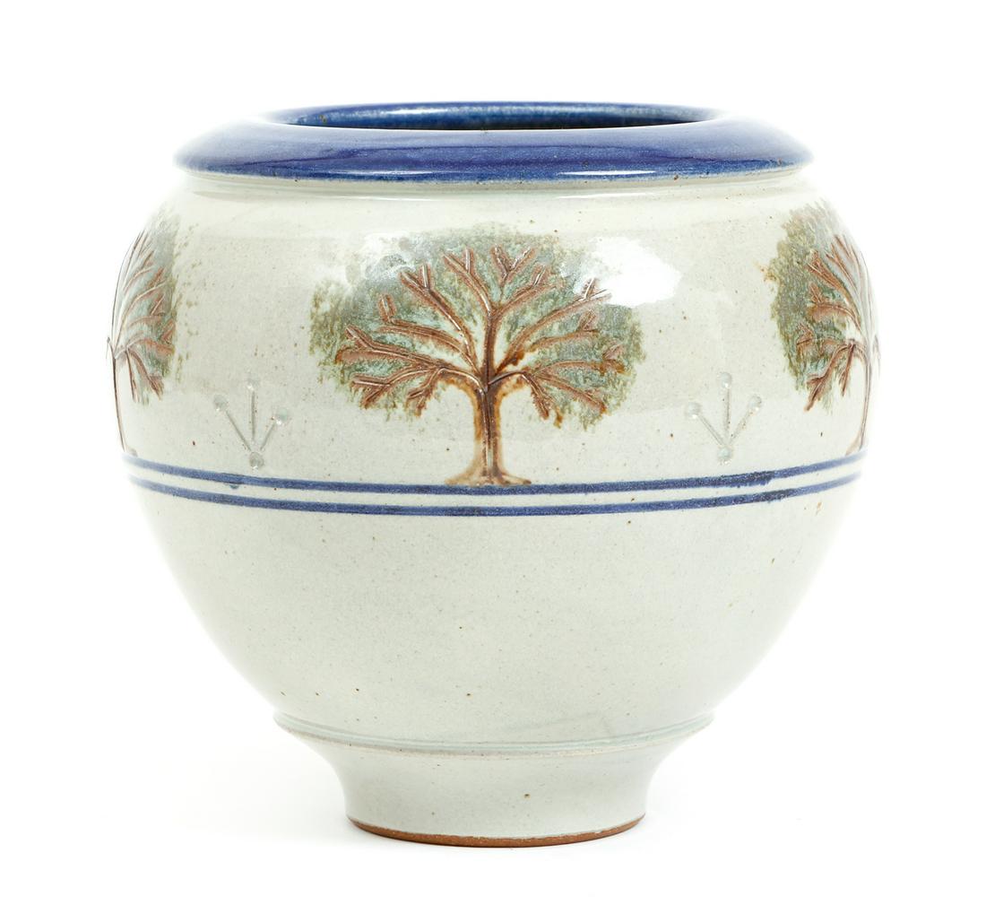 Loy Carpenter Ceramic Vase Glazed: Carpenter, Loy (American/West Virginia, 20th/21st century), Ceramic glazed vase with tree design, 2000, artist's name and date incised on base, 5 inch diameter, height 8 inches. Provenance: A lifelong