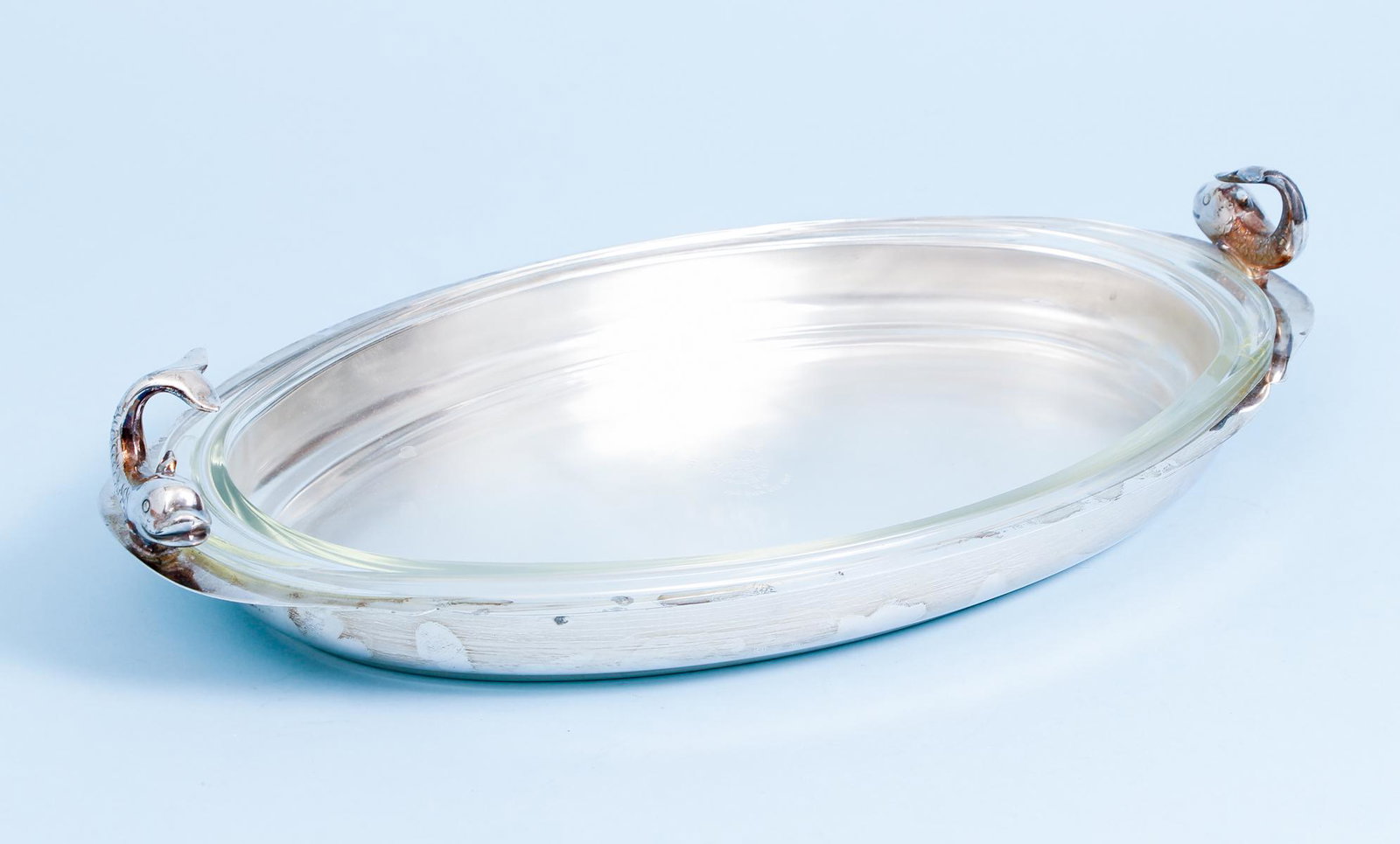 Eton Platter Fish Handled Silverplate: Silverplate platter with fish handles, made in Eton, UK, includes original Pyrex dish for cooking, 20 inches at widest diameter.