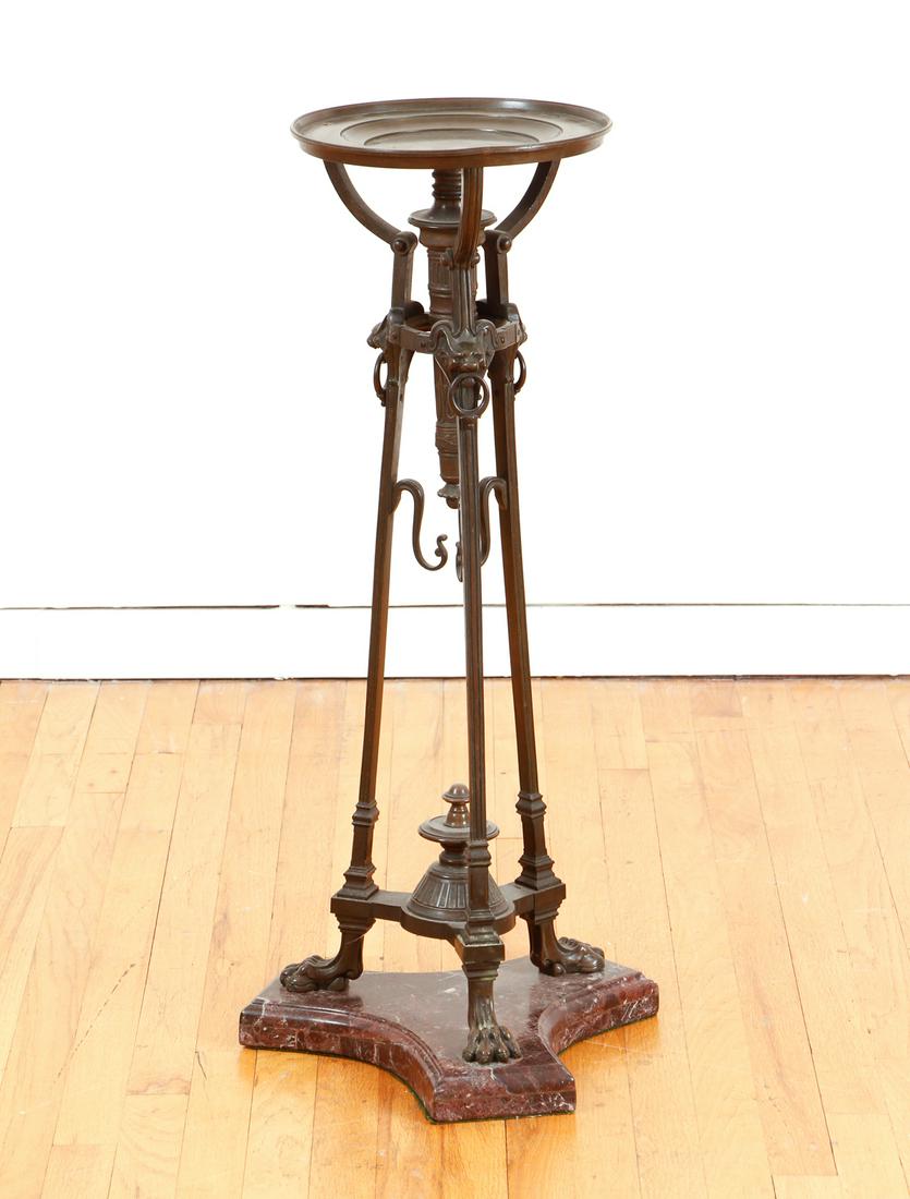 Bronze and Marble Footed Plant Stand: Bronze Footed Plant Stand with Marble Base, early 20th century, claw feet, feline figures with rings, height 34.5 inches, tray diameter 11.25 inches.