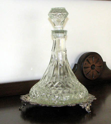 English Silver Salver by Robert Hennel w/crystal de: Title: English Silver Footed Salver by Robert Hennel, London with crystal decanter Medium: silver Dimensions: 8 inches diameter (salver); 11 x 7 x 7 inches (decanter)