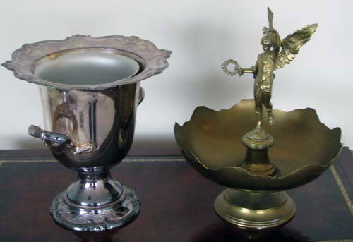 Silverplate Ice Bucket and Brass Ornamental Dish: Artist: Title: Silverplate Ice Bucket and Brass Ornamental Dish Medium: silverplate, brass Dimensions: 10 x 10 x 10; 13 x 10.5 x 10.5 inches