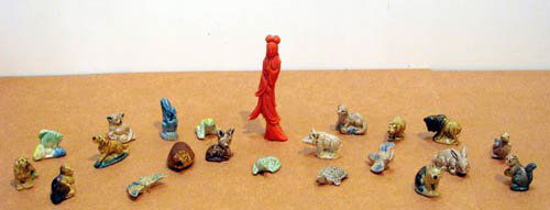 Collection of small animal figurines: Artist: Title: Collection of small animal figurines including frogs, birds, squirrels, dogs, etc Medium: glazed ceramic Dimensions: various Signature: some stamped Wade England