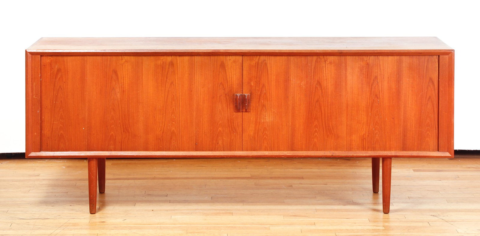 Mid Century Modern Credenza Tambour Teak: Mid Century Modern Credenza with tambour doors in the style of a design by Svend Aage Larsen, teak, 31 x 79 x 18 inches, no maker's mark, likely Scandinavian, c.1960s, four legs, three compartments, f