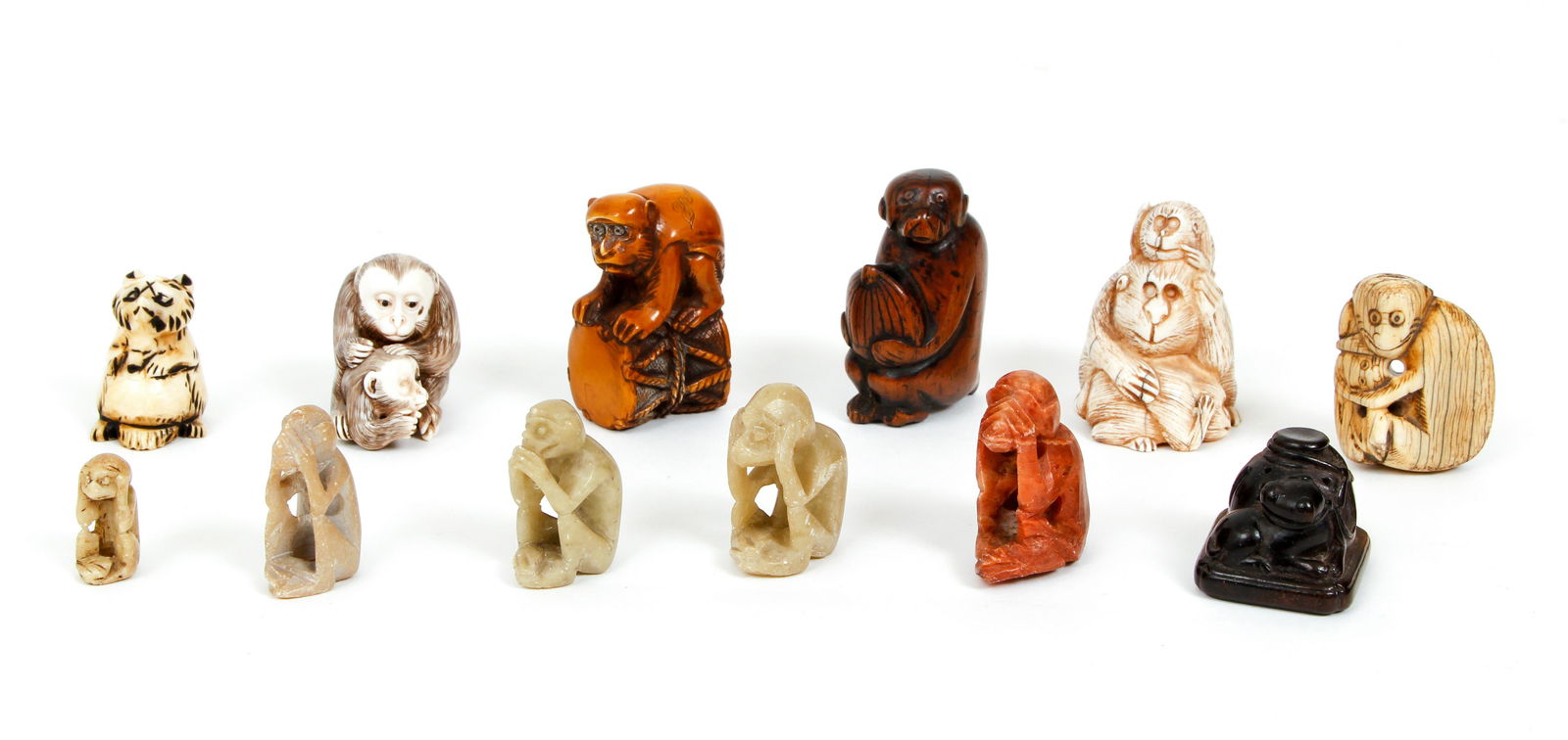 Collection of Japanese Netsukes and carved monkeys (1 of 11)