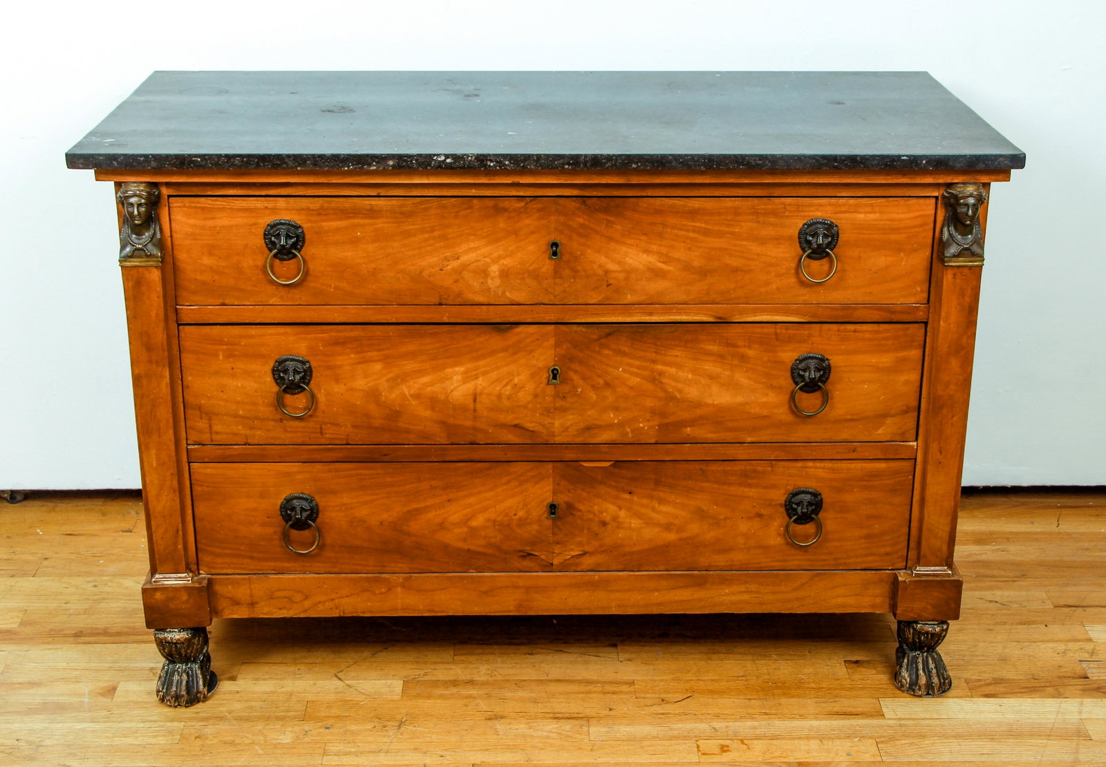 Biedermeier Empire Style Marble topped Chest of Drawers: French Biedermeier Empire style marble topped Chest of Drawers, circa 1850, with paw feet, 34 x 51 x 23 inches.