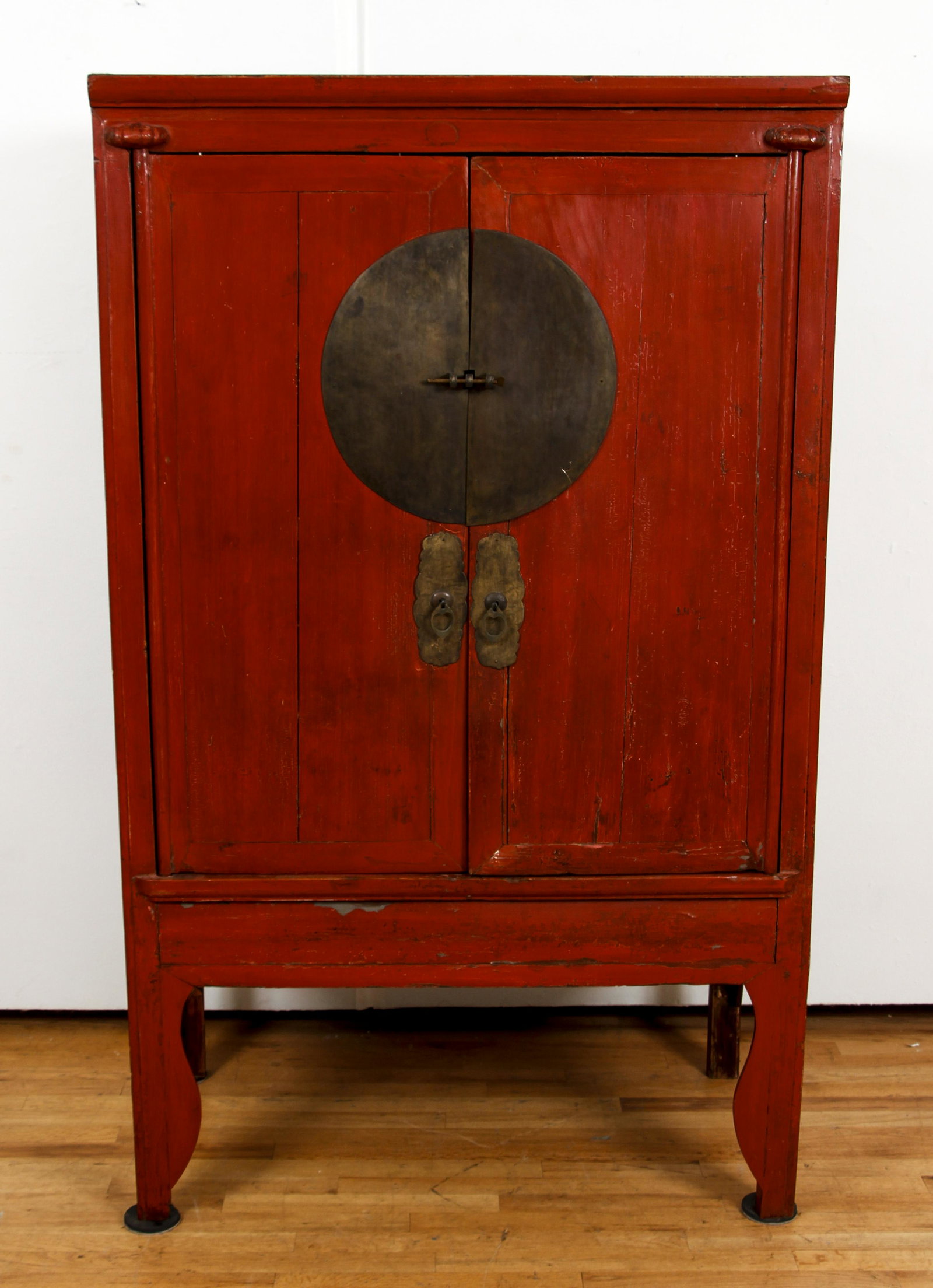 Antique Korean Provincial Cabinet: Provincial Cabinet with original red wash finish fitted with two interior drawers and shelf, 69 x 41.5 x 22.5 inches