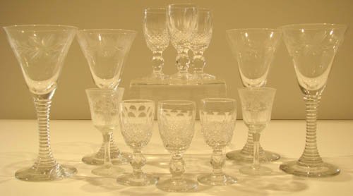 Assorted Cut Crystal Stemware: Artist: Title: Assorted Cut Crystal Stemware including: 6 liquor glasses with brilliant cut decoration, 2 liquor glasses with floral decoration, and 4 wine glasses with wra