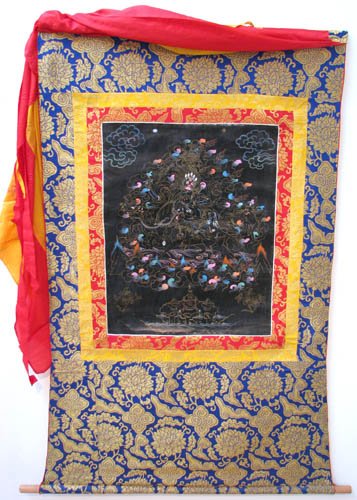 Covered Wall Hanging Tibetan Tonka: Artist: Tibetan Title: Wall Hanging Tibetan Tonka Date: c. 1970s Medium: painted canvas and silk, metallic embroidery Dimensions: 52 x 31 inch