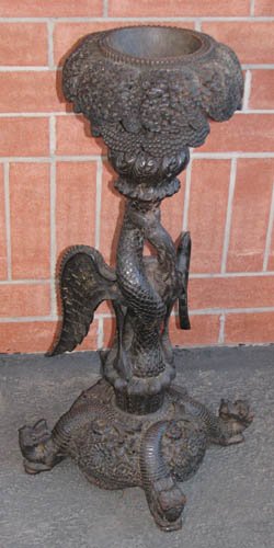 Indian Carved Candle Stand: Title: Indian Carved Candle Stand carved and lacquered wood with eagle and serpent base Medium: carved and lacquered wood Dimensions: 36 inches tall
