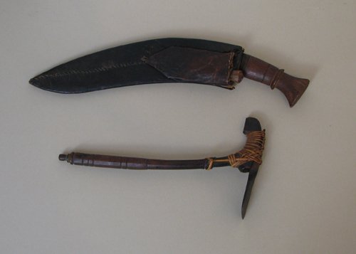 2 Indian Weapons, tomahawk and sheathed knives: Artist: 20th Century Indian Toolmakers Title: Big and Small Knife in Leather Sheath and Tomahawk Date: 20th Century Medium: Steel, Iron, leather, and ra