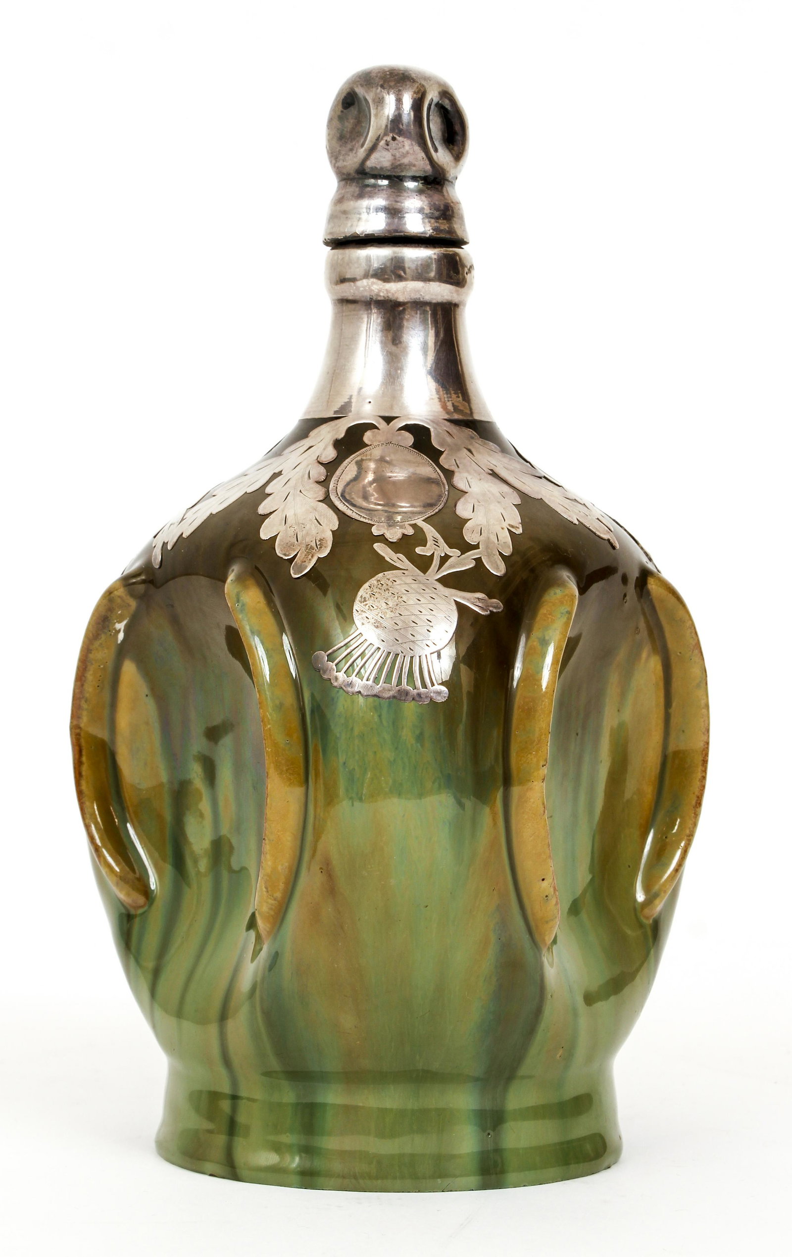 silver overlay Art Nouveau Fulper musical decanter: Early 20th century Fulper Art Pottery musical decanter. Pinched body with drip glaze and Silver thistle pattern overlay