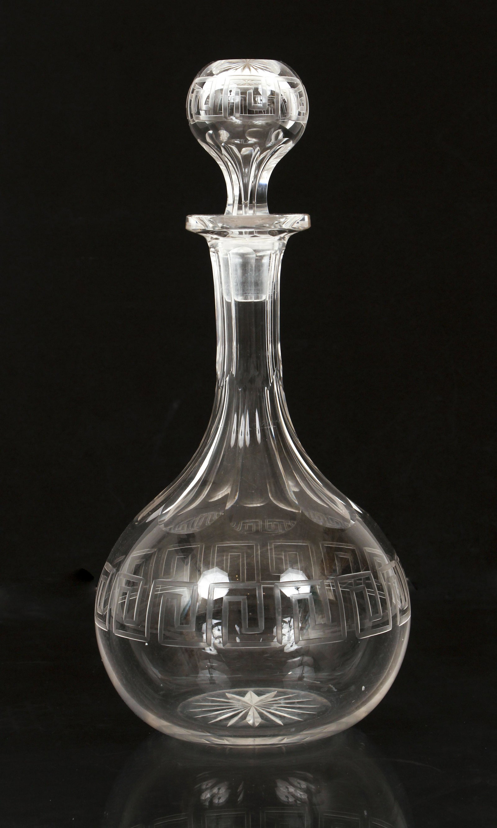 Crystal Decanter Greek Key Design: Crystal Decanter with Greek Key Design around base and stopper, 9 inches tall.