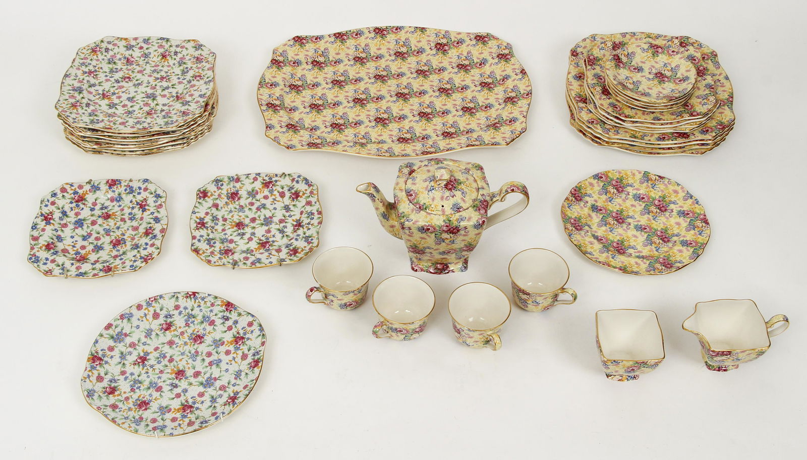 Royal Winton Wellbeck Tea and Desert Set: Collection of Royal Winton Wellbeck Chintz Tea and Desert Set along with some Old Cottage pattern, includes Teapot, Underplate, creamer, sugar bowl and 4 cups and matching saucers, 3 desert plates and