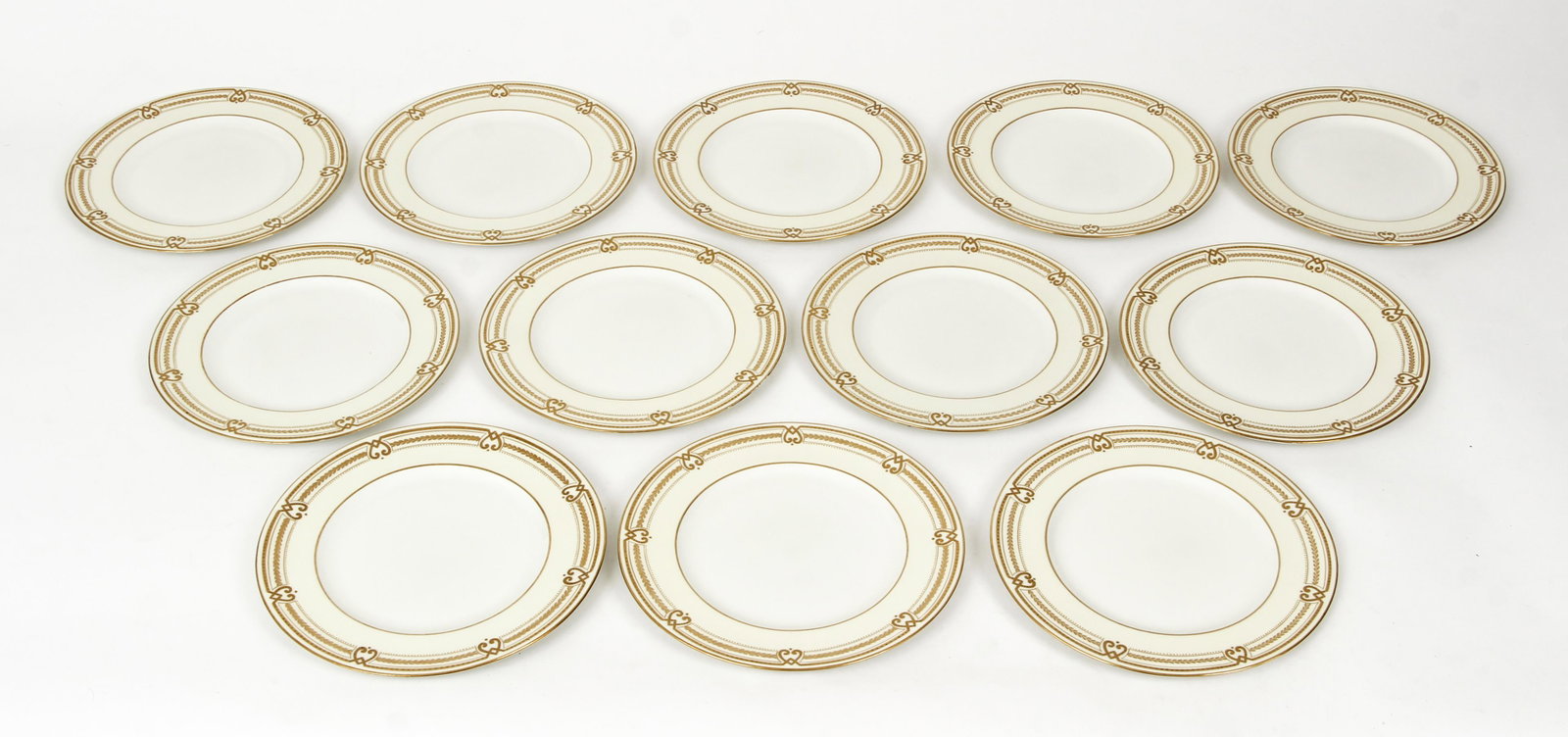 12 Caldwell Porcelain Dinner Plates: Set of 12 porcelain dinner plates by Caldwell of Philadelphia, Made in England, hallmarked and 23379 on bottom, 10 inches, lovely gilt decoration.