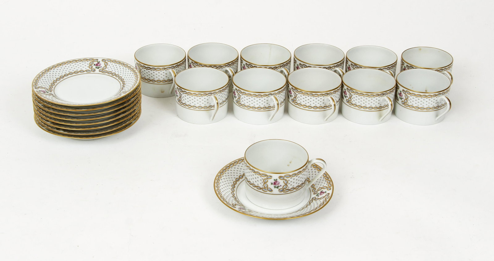 Set 12 Limoges Porcelain Demitasse Cups Saucers: Set of 12 Limoges porcelain Demitasse Cups and Saucers, French, made for Chastagner, hallmarked on bases, cups 3 inch diameter and 2 inches tall, saucers 6 inch diameter.