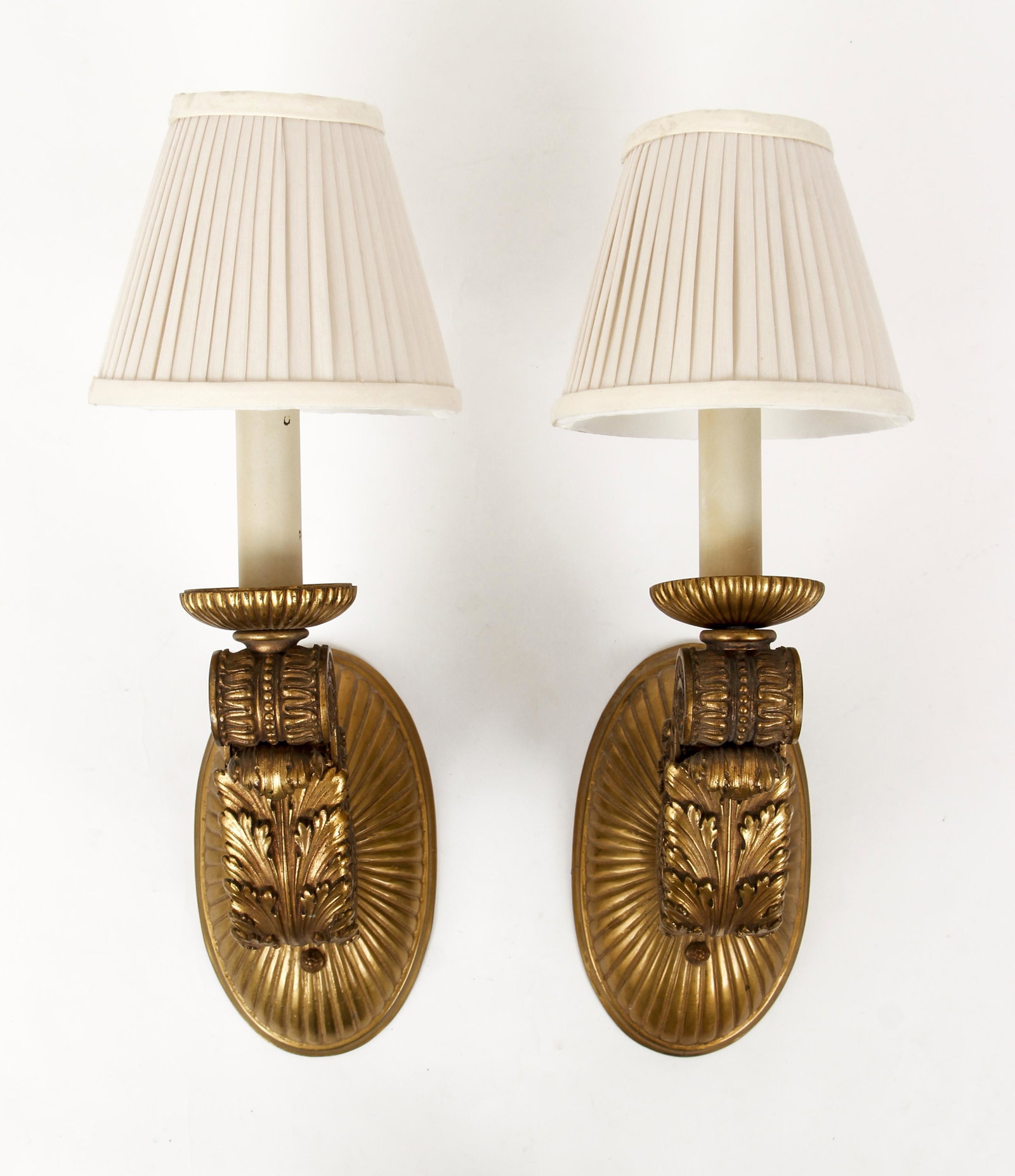 Pair of gilt bronze scrolling wall sconces: Early 20th Century, Heavy Wall sconces with extensive detail of acanthus leaves and scrolling classicism, 7.5 x 14 inches