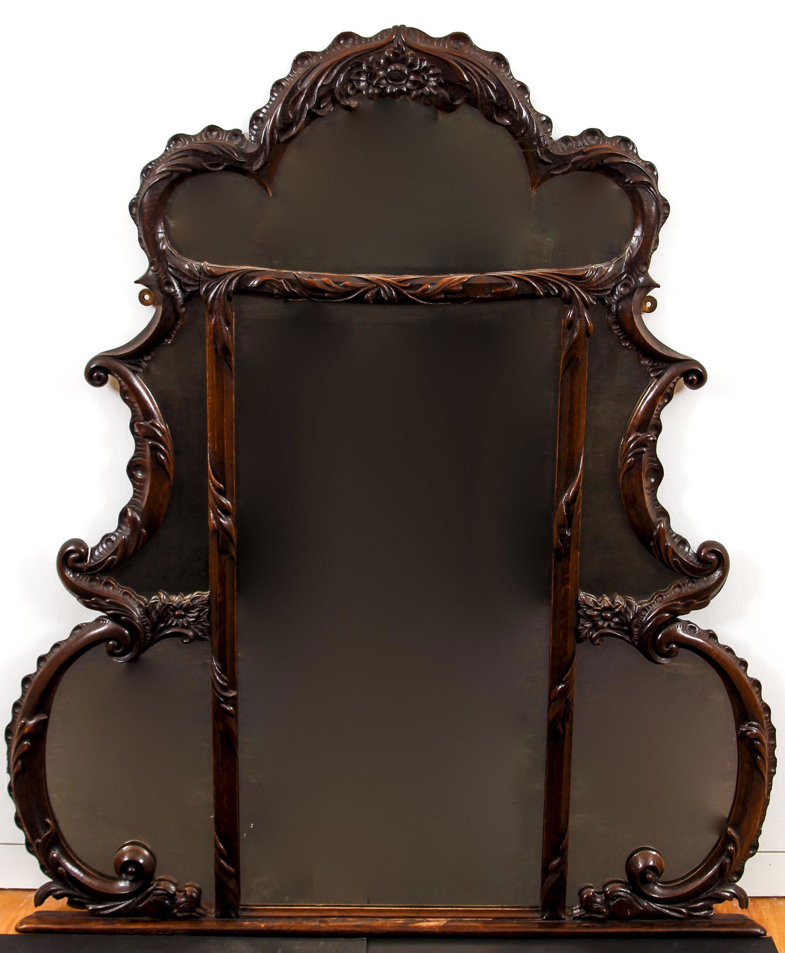 19th Century Victorian carved console Mirror: Lavishly carved wood multi panel mirror with dolphin and sea serpent motif, 55.5 x 47.5 inches