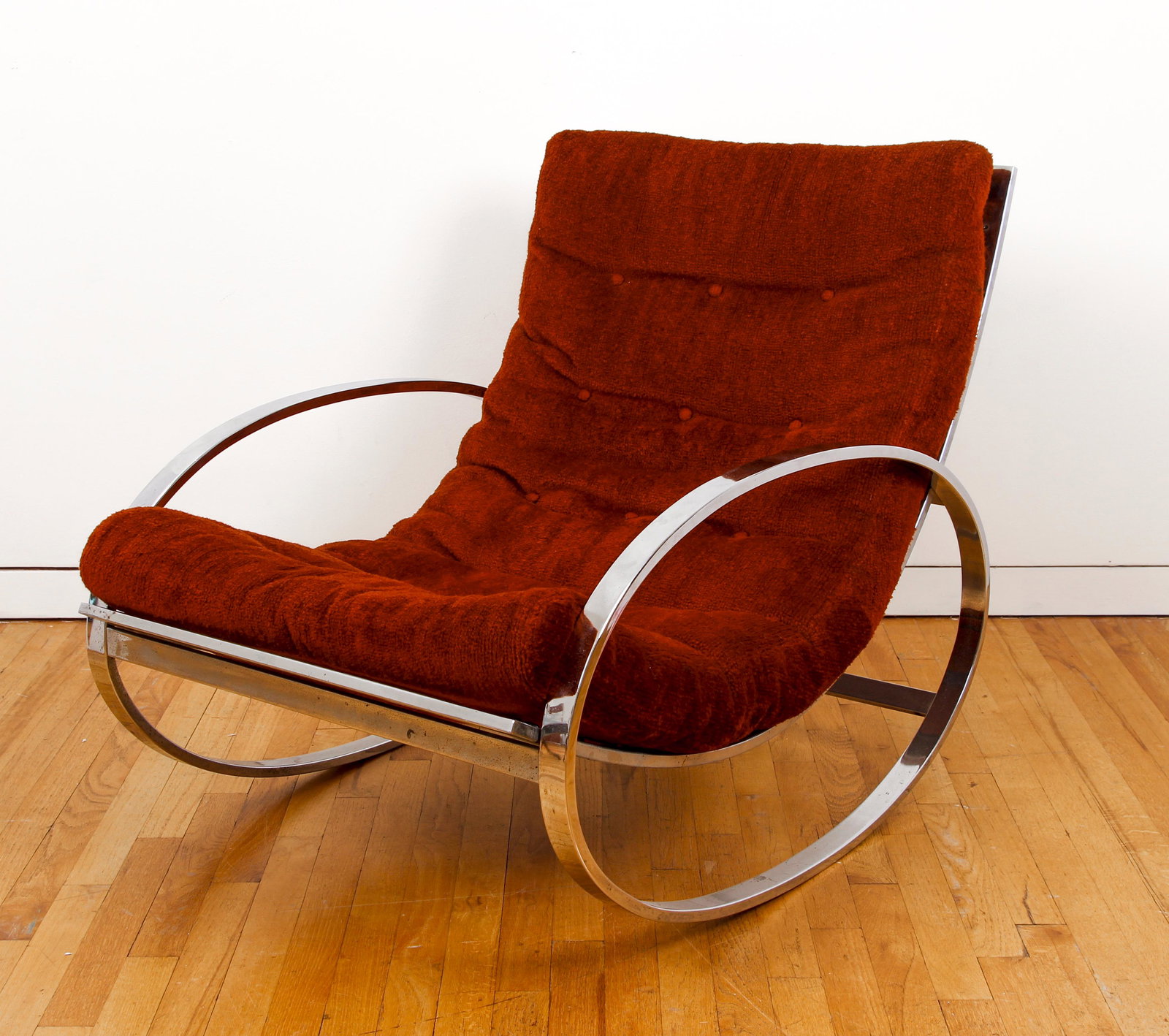 Milo Baughman or Zevi Ellipse Rocker: Mid Century Modern Milo Baughman style Ellipse rocker chair, likely by Renato Zevi for Selig, unmarked, c.1970s., orange fabric, chrome body, wired back and underside, 31.5 x 25 x 43 inches, a fun cha