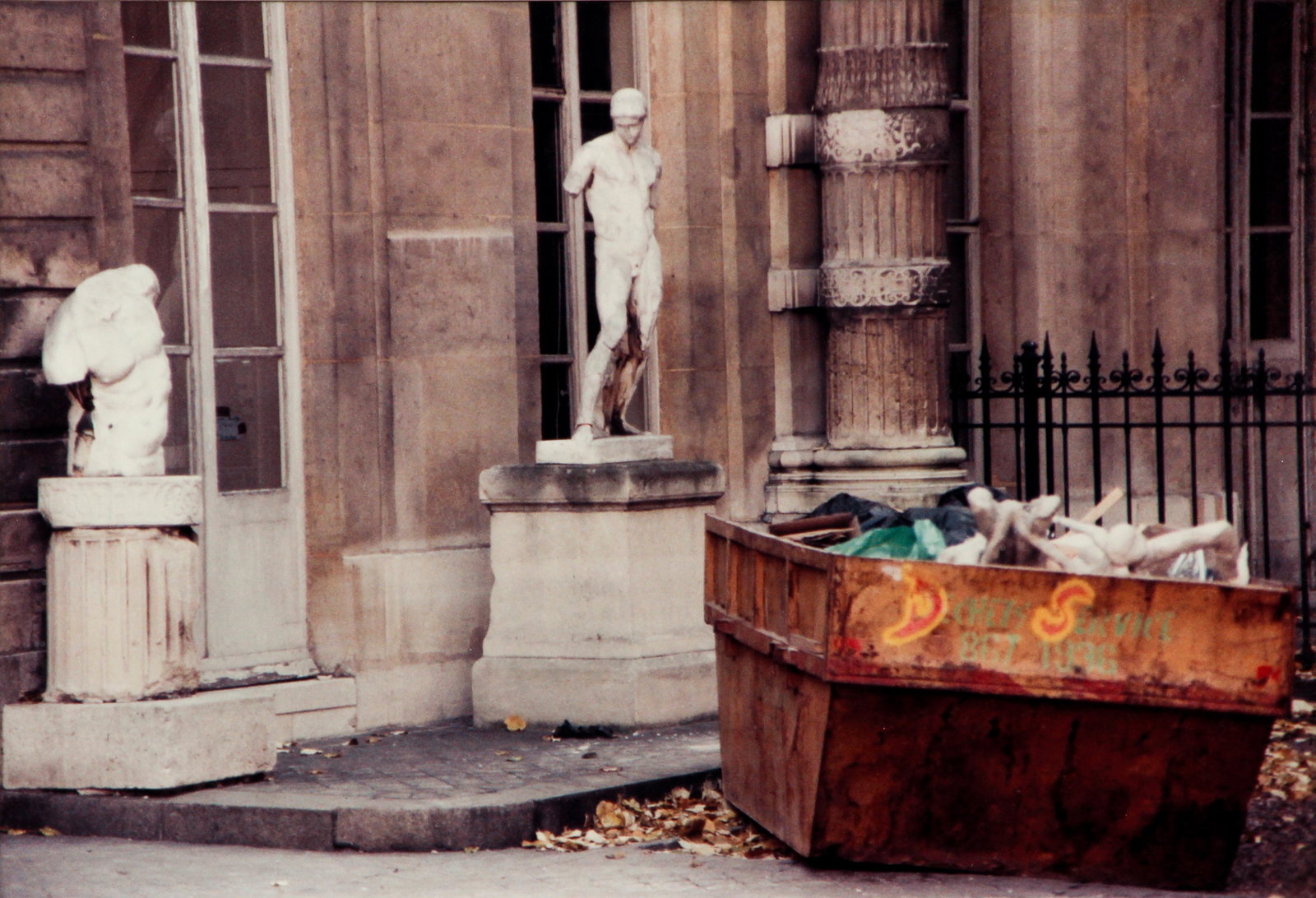 Contemporary Photograph Classical Sculpture Disposal: 20th Century Contemporary Photography School, Classical Sculpture Disposal Vignette, 1980's, color photograph, 9 x 13 inches, apparently unsigned, framed in a flat panel antique print frame measuring 
