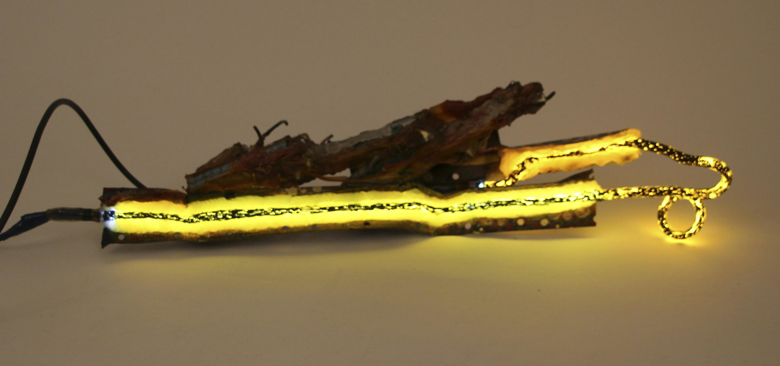 James Clark Kazebler sculpture: Clark, James O. (Contemporary American), Kazebler, 1986, steel, paint, plastic, silicone, glass, argon light, 28 x 6 x 6 inches, apparently unsigned.