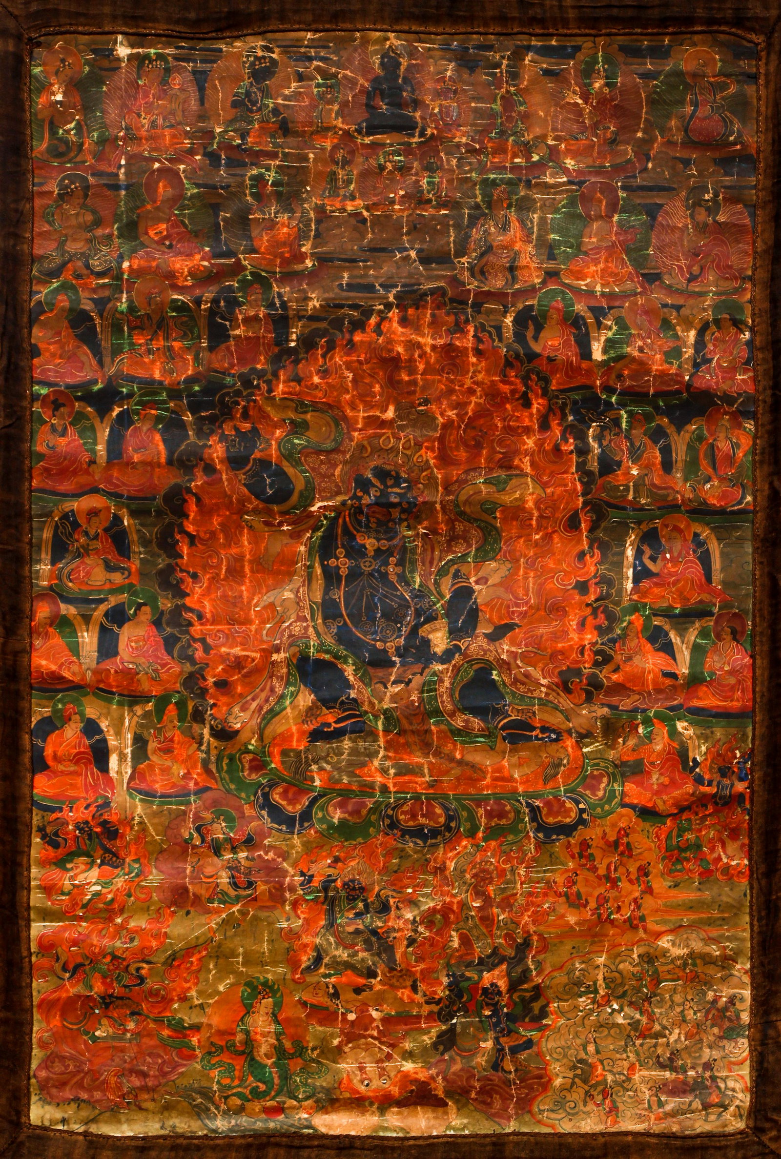 Tibetan Thangka Vajrapani Deities Early 19th century: Thangka of Vajrapani and Deities, Tibet, early 19th century, gouache on cotton with silk surround and brocade, 25.25 x 17, entire piece including surround measures 43.5 x 25 inches, central figure in 