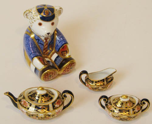 Miniature Imari Royal Crown Derby Tea Set: Title: 4 pcs Imari Royal Crown Derby miniatures, all stamped underside, lidded teapot, lidded sugar bowl, creamer and bear Medium: porcelain Dimensions: 1 3/4 x 2 3/4 x 1 5/8, 1 1/2 x 2 1/4 x 1 1/4, 1
