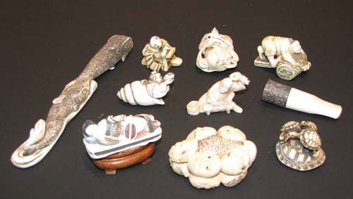 10 Assorted Ivory and Bone Netsukes: Title: 10 Assorted Ivory and Bone Netsukes including: swimming fish, laughing faces, woman sleeping, trapped carp, man dozing, turtles on turtle, man in shell, man cutting fish, man pushing barrel, ci