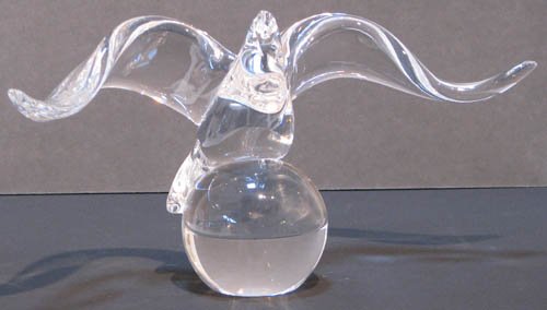 Steuben Glass Eagle on Ball: Artist: Steuben Glass Title: Eagle on Ball, Model #8130 Medium: Steuben Glass Dimensions: 6 x 12 x 3.25 Signature: incised Steuben on underside Provenance: Steuben
