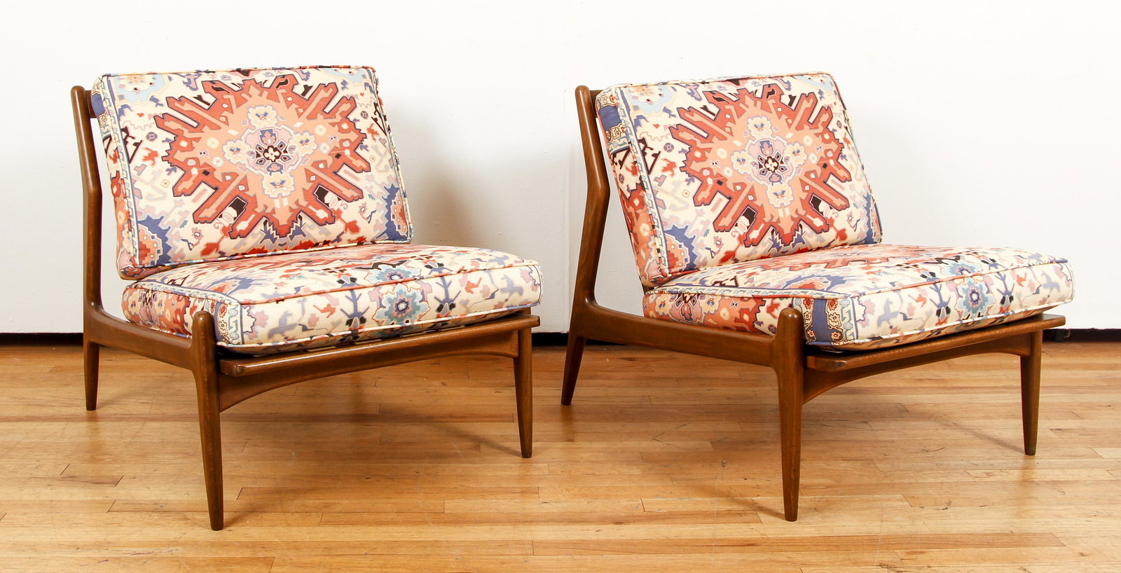 Pair Mid Century Modern Danish Lounge Chairs by Selig: Pair of Mid Century Modern Danish Lounge Chairs, wood base, fabulous 1980s style fabric upholstery, wood base measure 26.75 x 25.25 x 32 inches, Made in Denmark by Selig red label with cross has been