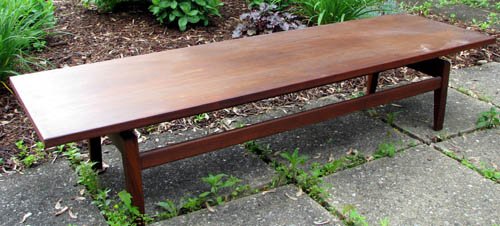 Jens Risom T.620 Coffee Table: Artist: Risom, Jens (Danish, b. 1916) Title: T.620 Coffee Table Medium: walnut Dimensions: 15 x 72 x 21 inches Signature: Jens Risom Design, Inc label on underside