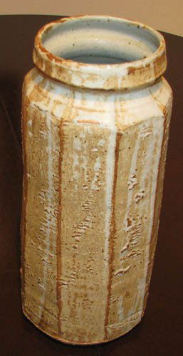 Beautiful Warren Mackenzie Tall Ceramic Vase: Artist: Mackenzie, Warren (American, b. 1924) Title: Tall Ceramic Vase with Octagonal Paddled Sides Medium: stoneware with brown and cream glaze Dimensions: 14 inches tall Signature: signed with monog