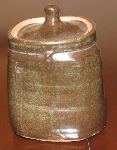 Warren Mackenzie Blue Green Glazed Covered Jar: Artist: Mackenzie, Warren (American, b. 1924) Title: Blue Green Glazed Covered Jar Medium: stoneware with blue green glaze Dimensions: 7 inches tall Signature: signed with monogram Provenance: