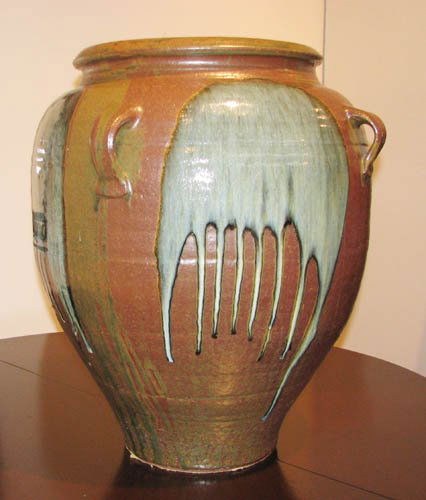 Important Willie Singleton Large Woodfired Glazed: Artist: Singleton, Willie (Contemporary American) Title: Woodfired and Glazed Large Jar with Handles Medium: cornstarch and creek clay glazed ceramic Dimensions: 24 x 23 x 23 inches Signature: Stamped