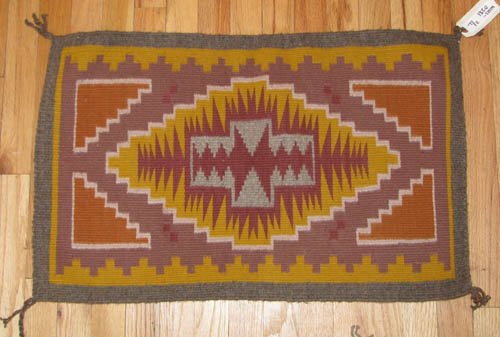 Two Native American Weavings: Artist:Begay, Mae; Nez, Stella Title:Two Weavings, one "Storm" pattern Medium:weavings Dimensions:18 x 30 inches; 16 x 17 inches