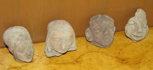 Four Mayan Head shards: Title: Four Mayan Head shards Medium: sculpted and incised ceramic Dimensions: 2.25 inches; 2.3 inches; 2 inches; 1.75 inches high Provenance: Ruth Frank Collection