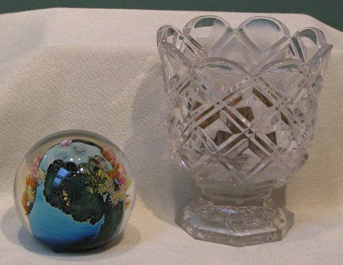 Cut Glass Votive and Josh Simpson Paperweight: Title: Footed Cut Glass Votive Candle Holder with interior prong base and Josh Simpson Glass Paperweight Medium: cut glass, blown glass Dimensions: 5 x 4.25 x 4.25 inches; 3 x 2.5 x 2.5 inches Sign