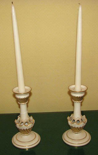 Pair of English Royal Worcester porcelain candlest: Title: Pair of English Royal Worcester gold and white porcelain candlesticks Medium: porcelain Dimensions: 8 inches high Provenance: The Estate of Ethel Halfant Feldman