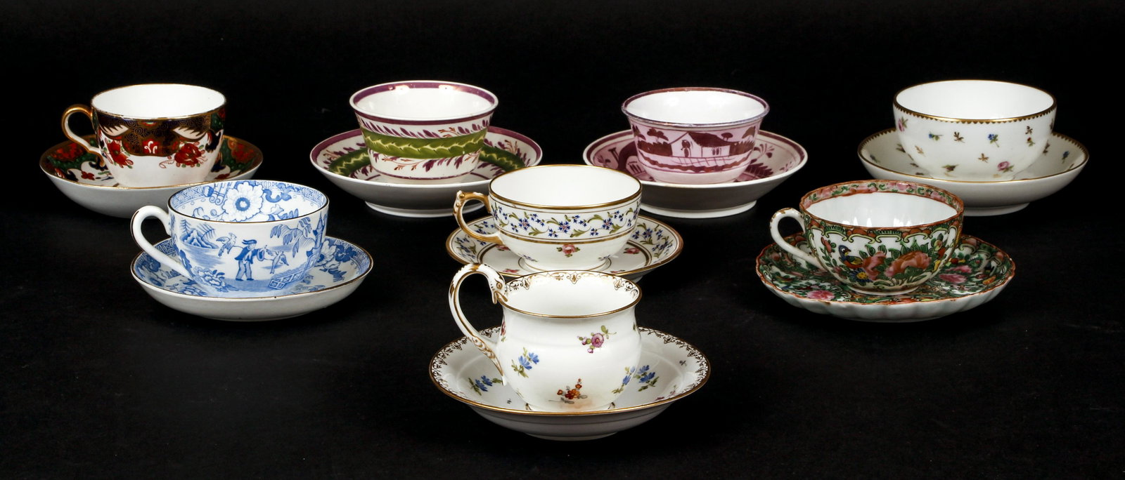 Group 8 Cups and Saucers Meissen Pouyat Limoges: Assorted group of 8 Cups and Saucers, includes one by Meissen with crossed swords mark denoting production in the 1930s-1940s, another marked J. Pouyat Limoges, one with blue fish mark to bottom, one 