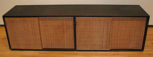 Florence Knoll Office Wall Hanging Cabinet: Artist: Knoll, Florence Title: Wall Hanging Office Cabinet with 3 drawers on left side, 3 adjustable shelves on the right side, cane doors, leather pulls Medium: wood and cane doors, leather pulls