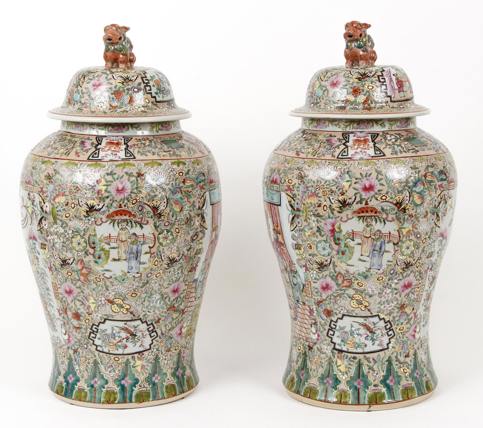 Pair Chinese Famille Rose Lidded Vases: Pair of good Chinese Famille Rose Lidded Vases with Fu Dog finials on lids, elaborate decoration including reserves with noblemen in court and noblewomen in a garden, 25 inches, with character signatu