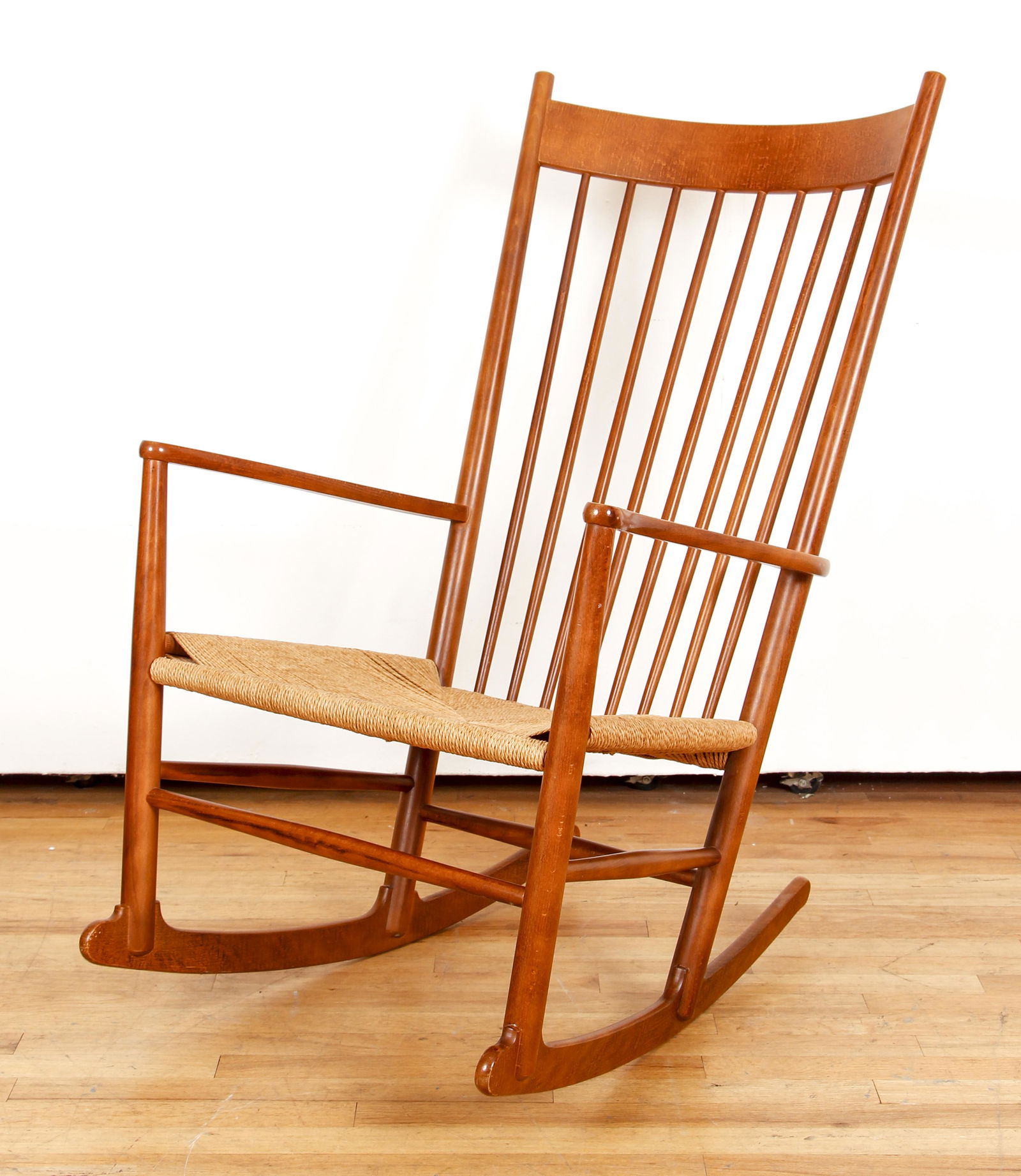 Hans Wegner J16 Rocking Chair Wood and Woven Seat MCM: Wegner, Hans, J16 Rocking Chair, wood frame with woven seat, Danish, 1983, later production of this famous mid century design, 41 x 23 x 30 inches, underside of arm impressed with maker's mark and dat