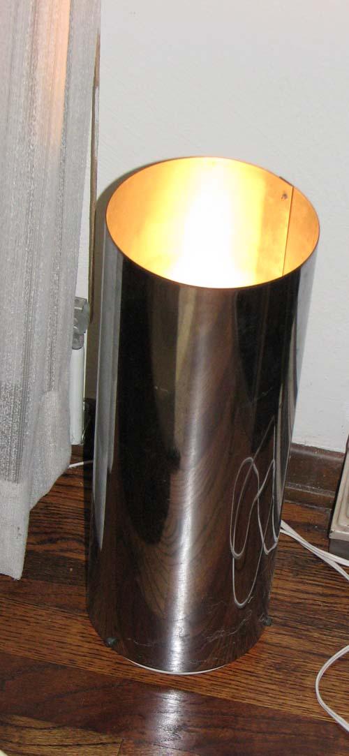 Pair Modern Lamps; Round Desk Lamp & Spotlight Floor: Title: Interesting Round Desk Lamp with Modern Spotlight Floor Lamp Medium: aluminum sheet; aluminum base with acrylic shade Dimensions: 15.5 x 5.75 x 5.75 inches; 21 x 13 x 13 inches Provenance: Esta