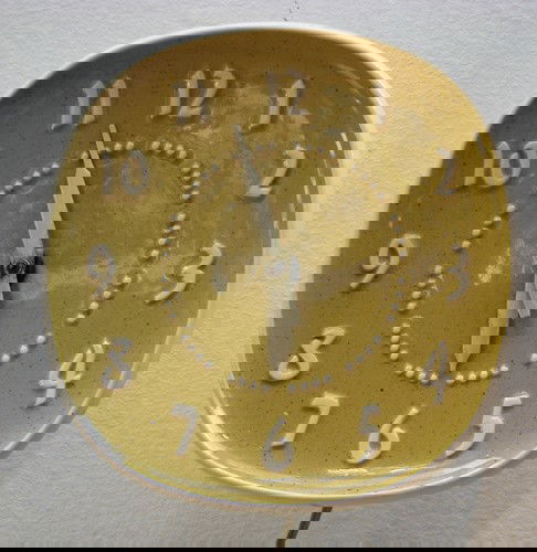 Russell Wright Ceramic Wall Clock: Artist: Wright, Russell for General Electric Title: Ceramic Wall Clock Medium: ceramic Dimensions: 8 x 7.75 x 2.7 inches Signature: Inscribed Russel Wright in top reverse