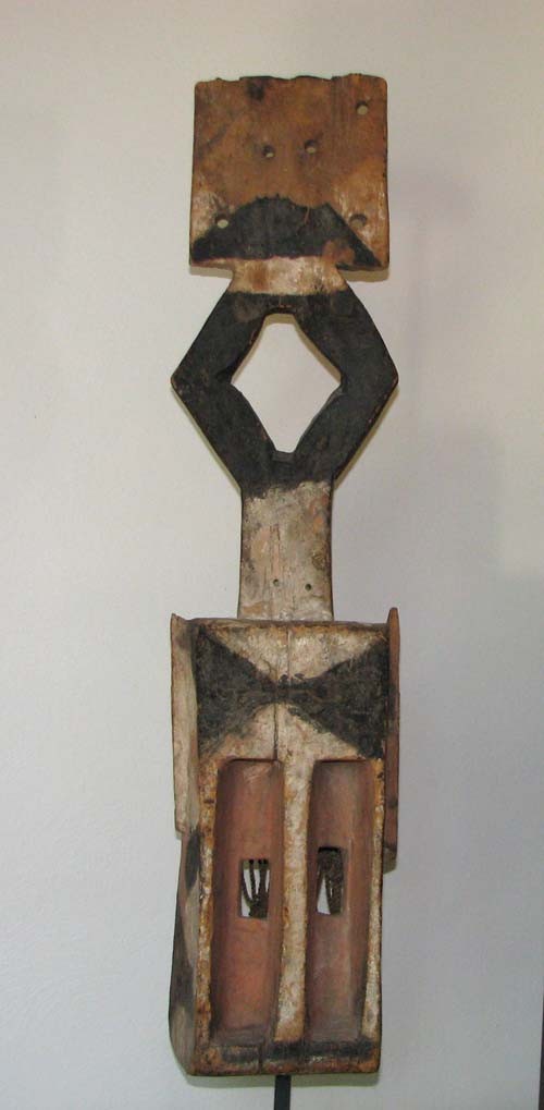 Dogon Carved African Mask bottom half: Artist: Dogon Mali Kanaga Title: Kanaga Mask Medium: carved and polychromed wood Dimensions: 32.5 x 7 x 6.5 inches Provenance: Tribal Arts, NY, Estate of Diana Caplan, Pittsburgh, PA