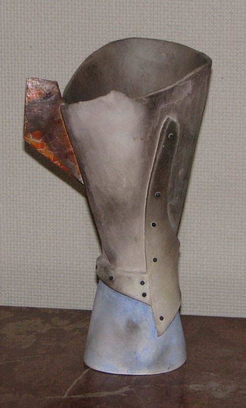 Jerry Caplan Ceramic Vessel with Nail Decoration: Artist: Caplan, Jerry Title: Ceramic Vessel with Nail Decoration Medium: raku ceramic with nail decoration Dimensions: 10 x 5.5 x 5 inches Signature: apparently unsigned Provenance: The Estate