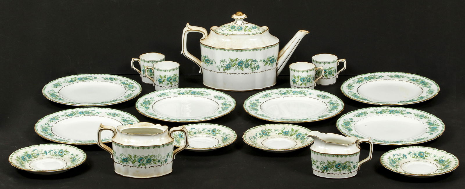 Royal Crown Derby Porcelain Tea Service: Royal Crown Derby for Tiffany Porcelain Tea Service, green floral and gilt with teapot, sugar bowl, cream pitcher, 4 demitasse cups, 4 saucers (teapot measures 6.75 x 11.5 x 5 inches), 6 dessert plate