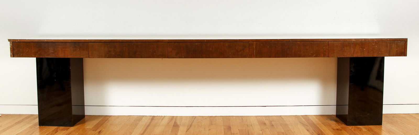 Modern Cantilevered Built in Buffet: MCM cantilevered wall Buffet or Credenza, with 5 drawers and white laminate top, 6 x 119 x 16 inches, no apparent maker's mark, meant to drill directly into the wall (supports shown for reference only