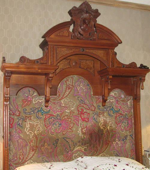 Renaissance Revival Headboard: Renaissance Revival Headboard wired with two reading lights, extensively carved pedament Medium: carved wood Dimensions: 94 x 62.5 x 11.75 inches Provenance: The Estate of Millie and Dr. Leonard Schwa